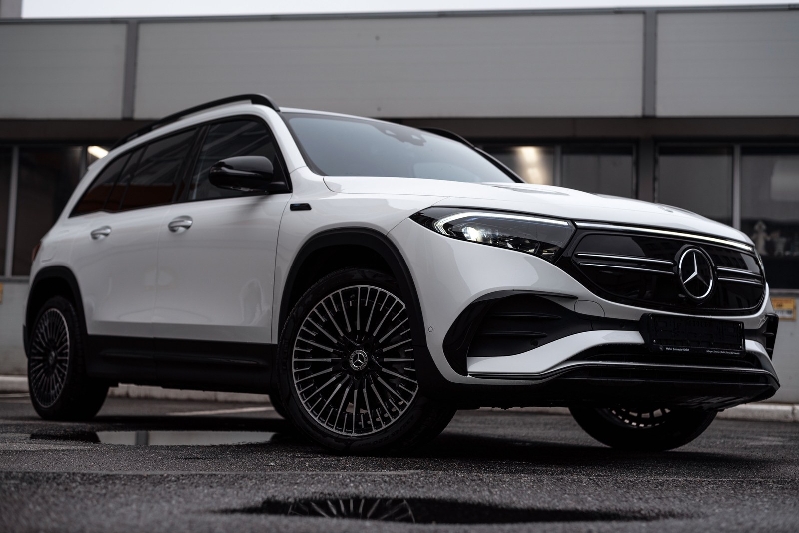 White Mercedes-Benz EQB viewed from the front three-quarter angle